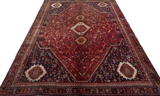 Surface texture of 2000s Shiraz rug with natural Wool and intricate pattern