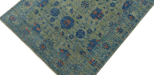 Backside of handmade New Farahan rug showing knot structure and weave density
