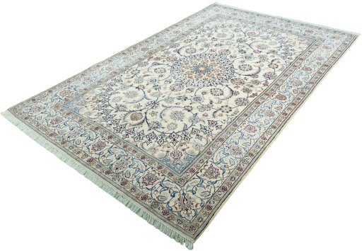 Corner detail of 2000s Nain rug showing border pattern and Wool pile