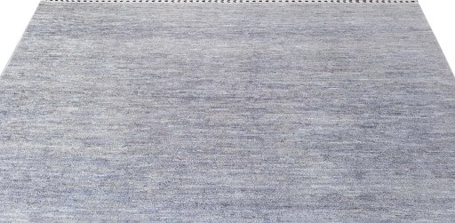 Backside of handmade New Morocco rug showing knot structure and weave density