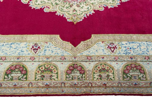 Corner detail of 1970s Kerman rug showing border pattern and Wool pile