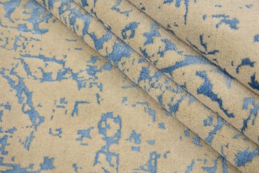 Surface texture of New Organic rug with natural Wool and intricate pattern
