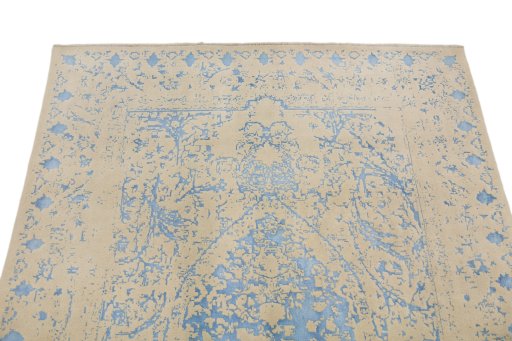 Backside of handmade New Organic rug showing knot structure and weave density