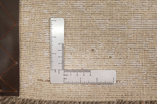 Corner detail of New Organic rug showing border pattern and Wool pile