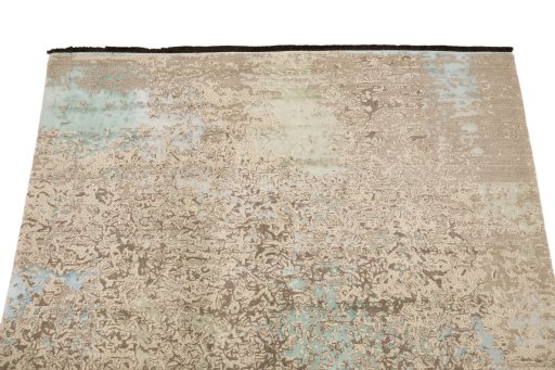 Backside of handmade New Organic rug showing knot structure and weave density