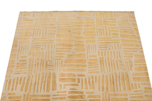 Backside of handmade New Organic rug showing knot structure and weave density