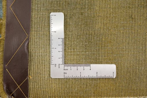 Corner detail of New Organic rug showing border pattern and Wool pile