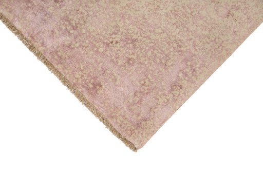 Backside of handmade New Organic rug showing knot structure and weave density