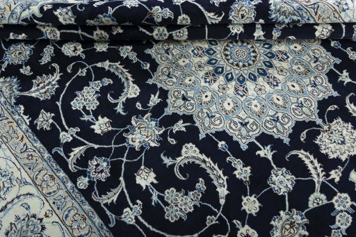 Close-up detail of New Nain rug from Iran / Persia showing Wool weave