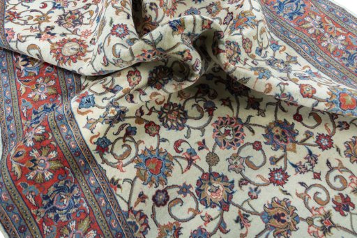 Surface texture of 2000s Sarough rug with natural Wool and intricate pattern