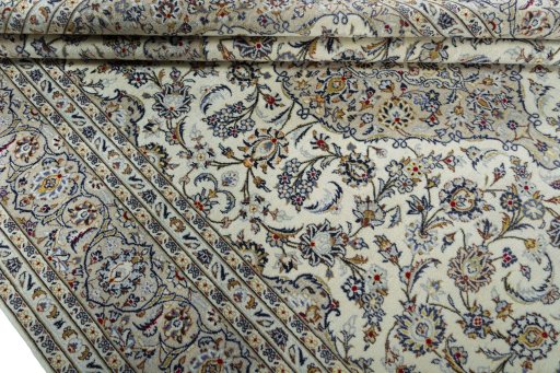 Close-up detail of 2000s Kashan rug from Iran / Persia showing Wool weave