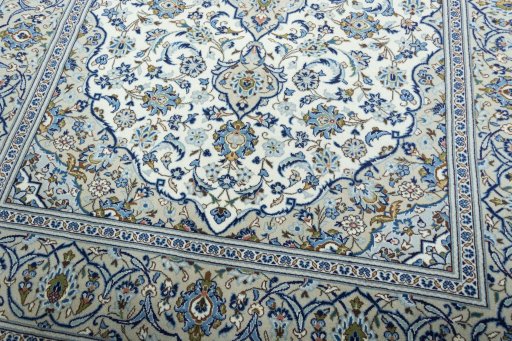 Close-up detail of 2000s Kashan rug from Iran / Persia showing Wool weave