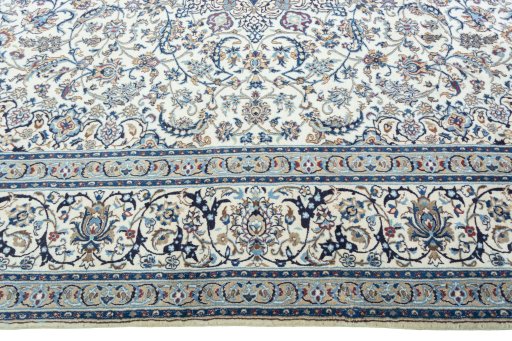 Corner detail of New Nain rug showing border pattern and Wool pile