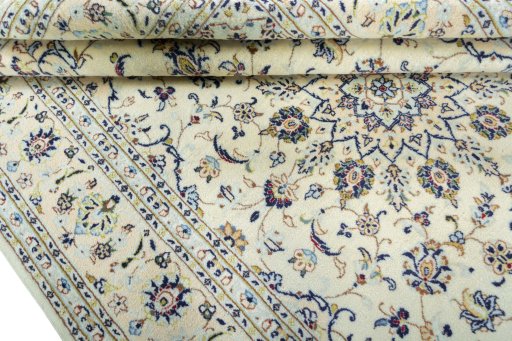 Close-up detail of New Kashan rug from Iran / Persia showing Wool weave