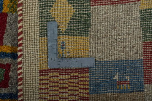 Close-up detail of 2000s Persian Gabbeh rug from Pakistan showing Wool weave