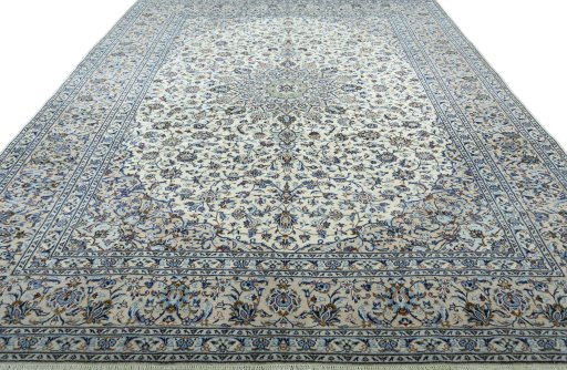 Surface texture of 2000s Kashan rug with natural Wool and intricate pattern