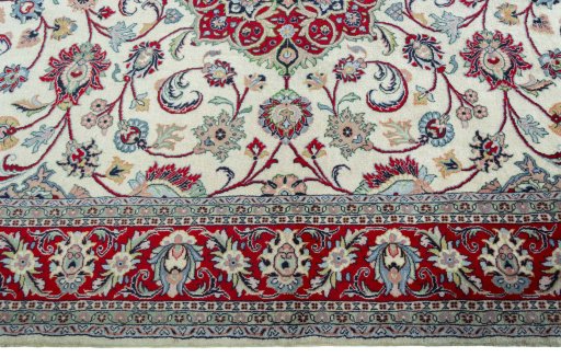 Corner detail of 2000s Sarough rug showing border pattern and Wool pile