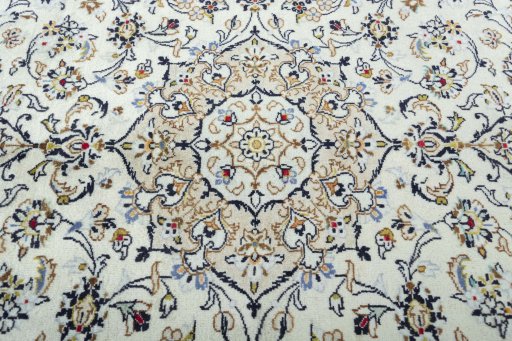 Central medallion detail of 2000s Kashan rug from Iran / Persia