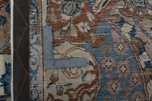 Backside of handmade 2000s Kashmar rug showing knot structure and weave density