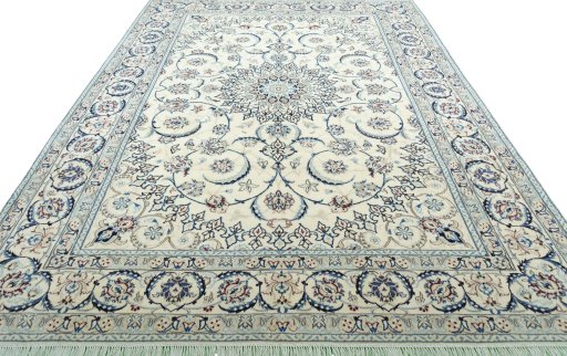 Surface texture of 2000s Nain rug with natural Wool and intricate pattern