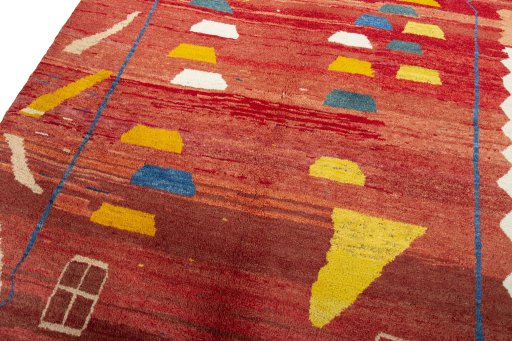 Backside of handmade 2000s Persian Gabbeh rug showing knot structure and weave density