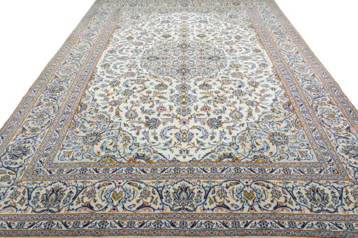 Surface texture of 2000s Kashan rug with natural Wool and intricate pattern