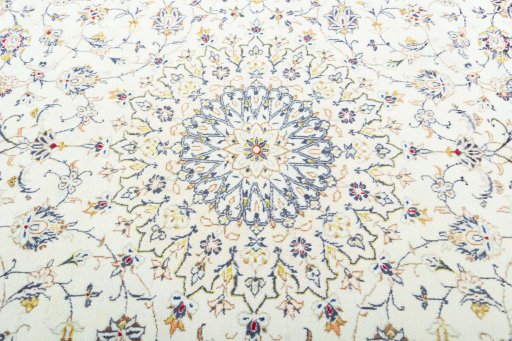 Central medallion detail of 2000s Kashan rug from Iran / Persia