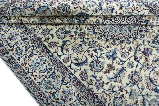 Close-up detail of 2000s Nain rug from Iran / Persia showing Wool weave