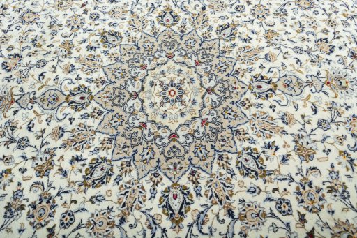 Central medallion detail of 2000s Kashan rug from Iran / Persia
