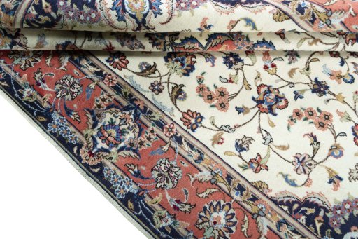 Close-up detail of 2000s Kashan rug from Iran / Persia showing Wool weave