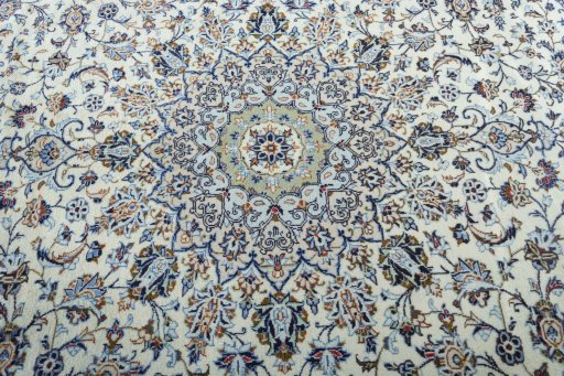 Central medallion detail of 2000s Kashan rug from Iran / Persia