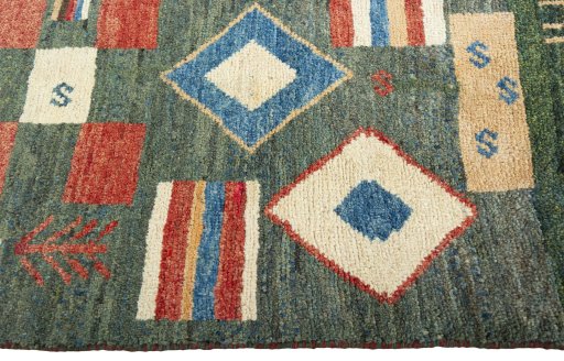 Close-up detail of 2000s Persian Gabbeh rug from Iran / Persia showing Wool weave