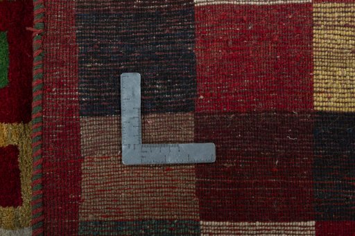 Close-up detail of 2000s Persian Gabbeh rug from Pakistan showing Wool weave