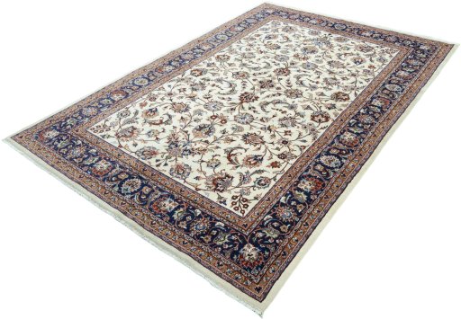 Corner detail of 2000s Mashad rug showing border pattern and Wool pile