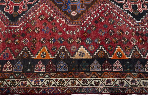 Close-up detail of 2000s Shiraz rug from Iran / Persia showing Wool weave