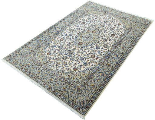 Corner detail of 2000s Kashan rug showing border pattern and Cork pile