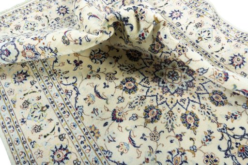 Surface texture of New Kashan rug with natural Wool and intricate pattern