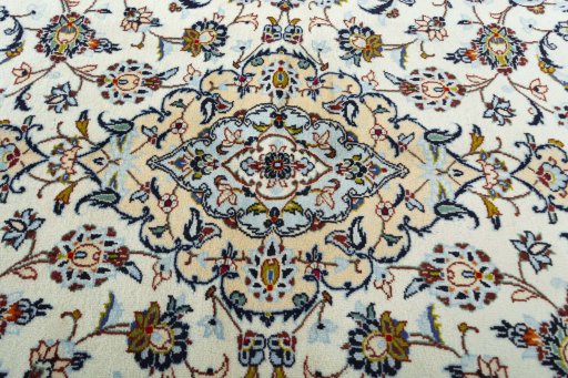 Central medallion detail of 2000s Kashan rug from Iran / Persia