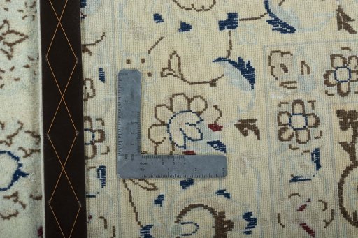 Backside of handmade 2000s Nain rug showing knot structure and weave density