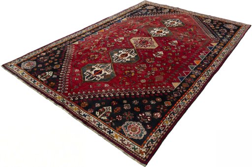 Corner detail of 2000s Shiraz rug showing border pattern and Wool pile