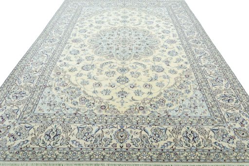 Surface texture of 2000s Nain rug with natural Wool and intricate pattern