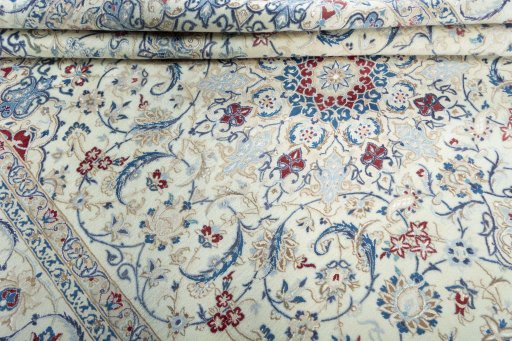 Close-up detail of 2000s Nain rug from Iran / Persia showing Wool weave