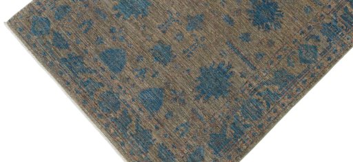 Backside of handmade New Farahan rug showing knot structure and weave density