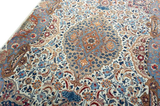Backside of handmade 2000s Kashmar rug showing knot structure and weave density