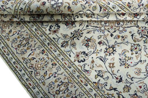 Close-up detail of 2000s Kashan rug from Iran / Persia showing Wool weave