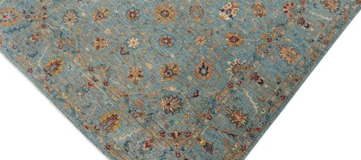 Backside of handmade New Farahan rug showing knot structure and weave density