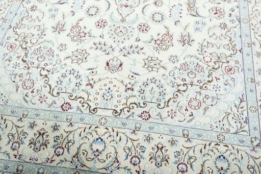 Close-up detail of 2000s Nain rug from Iran / Persia showing Wool weave