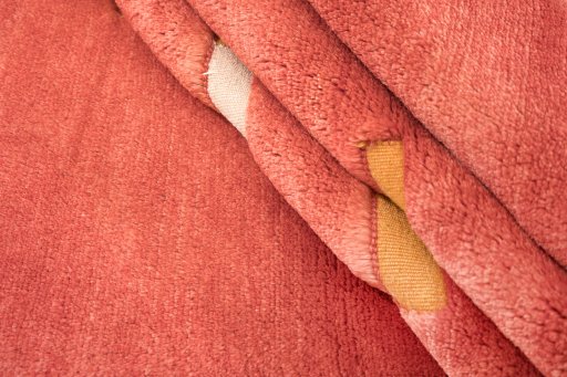 Corner detail of New Kilim Gabbeh rug showing border pattern and Wool pile