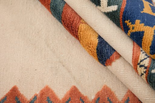Corner detail of New Kilim Gabbeh rug showing border pattern and Wool pile
