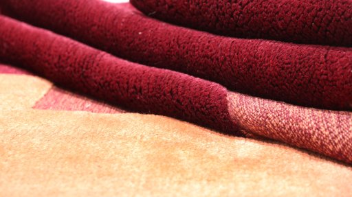Close-up detail of 1980s Kilim Gabbeh rug from Iran / Persia showing Wool weave